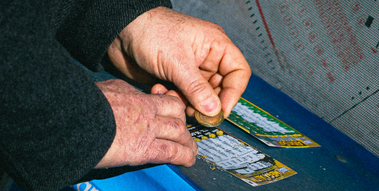 Photo by Adem Erkoç : https://www.pexels.com/photo/close-up-of-hands-scratching-lottery-tickets-30427909/